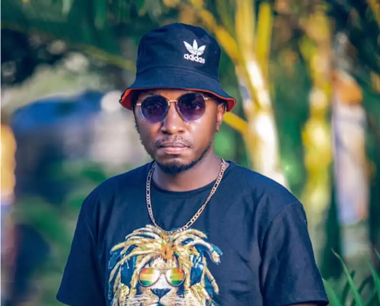 Gravity Omutujju Is Assaulted And Dragged To The Police By Frank Ntambi